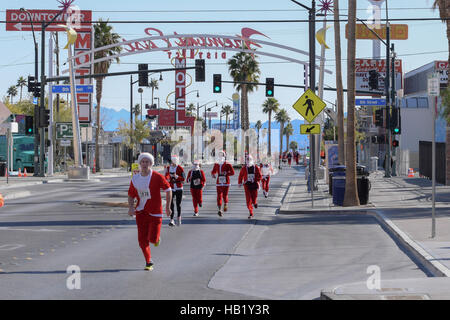 Las Vegas, Nevada, USA. 3rd Dec, 2016. The 2016 Las Vegas Great Santa Run is the largest cotumed 5k and biggest annual fund raiser for Opportunity Village in Las Vegas. December 3rd 2016 in Downtown Las Vegas, NV. Credit:  The Photo Access/Alamy Live News Stock Photo