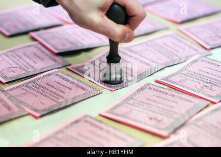 Rome, Italy. 03rd Dec, 2016.  An official stamps ballot papers at a polling station ahead of the referendum on constitutional reform, in Rome, Italy Credit:  Sara De Marco/Alamy Live News Stock Photo