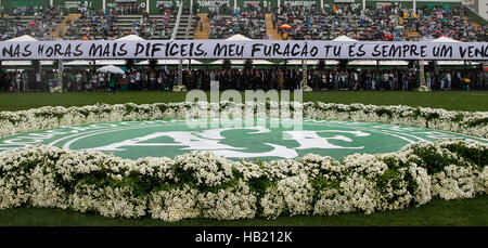 Chapeco, Brazil. 3rd Dec, 2016. Image provided by the Brazilian Presidency shows people standing for the tribute and collective funeral of the Chapecoense football team members who were killed in an air crash days ago in Colombia, at the Arena Conda Stadium, in Chapeco, in the state of Santa Catarina, Brazil, on Dec. 3, 2016. Credit:  Beto Barata/Presidency of Brazil/Xinhua/Alamy Live News Stock Photo