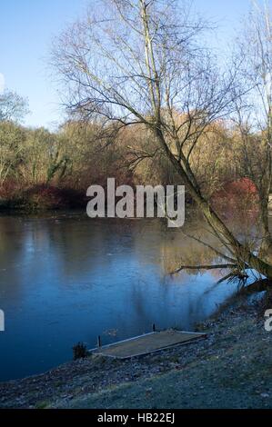 Bracknell, UK. 4th December, 2016. Firshermen taking part in a competition on a frozen lake at Westmorland Park, Bracknell Credit:  Andrew Spiers/Alamy Live News Stock Photo