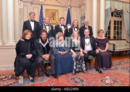 Washington DC, USA. 3rd Dec, 2016. U.S Secretary of State John Kerry and his wife Teresa Heinz Kerry pose for a group photo with the 2016 Kennedy Center Honor Award recipients following the gala dinner at the Department of State December 3, 2016 in Washington, DC. First row left to right are: Teresa Heinz Kerry, Al Pacino, Mavis Staples, Martha Argerich, James Taylor, and Kennedy Center President Deborah Rutter; back row, from left, Secretary of State John Kerry, Joe Walsh, Don Henley, Timothy Schmit, and David Rubinstein. Credit:  Planetpix/Alamy Live News Stock Photo