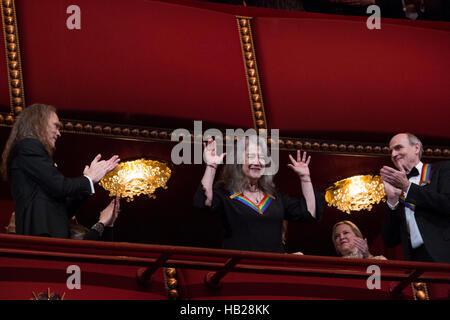 Washington DC, USA. 4th Dec, 2016. 2016 Kennedy Center Honoree pianist Martha Argerich waves at the beginning of the Kennedy Center Honors, at the Kennedy Center, December 4, 2016, Washington, DC. The 2016 honorees are: Argentine pianist Martha Argerich; rock band the Eagles; screen and stage actor Al Pacino; gospel and blues singer Mavis Staples; and musician James Taylor. Credit: Aude Guerrucci/Pool via CNP /MediaPunch Credit:  MediaPunch Inc/Alamy Live News Stock Photo