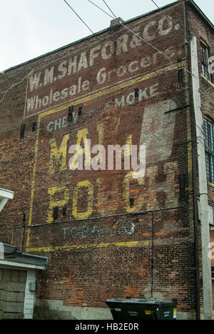 Historic painted signs on a commercial building in Indiana. Stock Photo