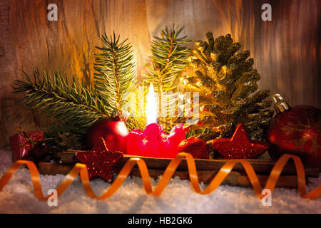 Red  Advent candle. Stock Photo