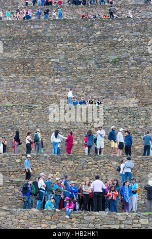 CUSCO, PERU, JANUARY 15: Group of tourists visiting Ollantaytambo Inca ruins. Peru 2015 Stock Photo