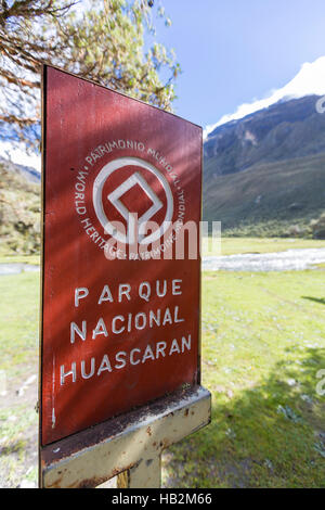 HUASCARAN, PERU, JANUARY 23: Welcome rusted sign post at the entrance of the Huascaran National Park near the Lago 69 (Lake 69) in Huaraz Stock Photo