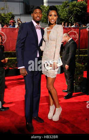 NBA star Paul George and Callie Rivers arrives at the 2014 ESPY Awards at Nokia Theatre L.A. Live on July 16, 2014 in Los Angeles, California. Stock Photo