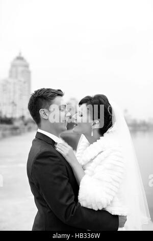 Gentle embrace bride and groom Stock Photo