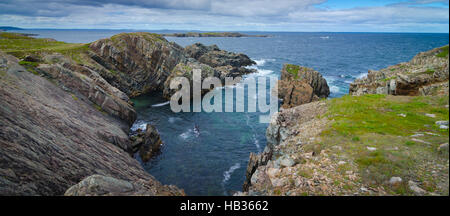 Huge rock and boulder outcrops along Cape Bonavista coastline in Newfoundland, Canada. Stock Photo