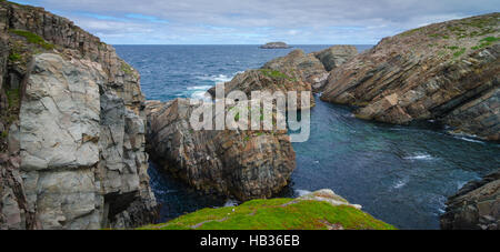 Huge rock and boulder outcrops along Cape Bonavista coastline in Newfoundland, Canada. Stock Photo