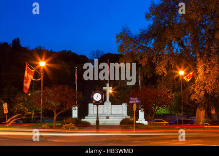 A memorial or statue along the Main Street (Grand River Street) downtown at dusk in Paris, Brant County, Ontario, Canada. Stock Photo