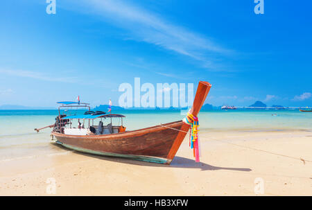 Long tail boat on tropical beach Stock Photo