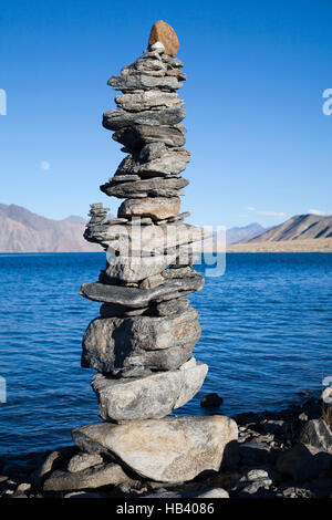 Stone cairn or chorten on the Indian side of Pangong Tso Lake situated on the Indian Chinese border in Ladakh Stock Photo