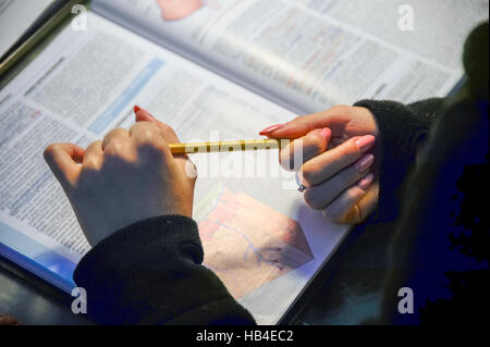 Hands  studying anatomy Stock Photo