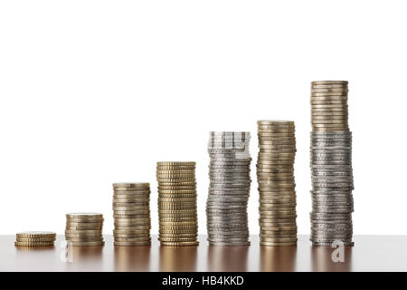 stacked coins ascending flat angle view Stock Photo