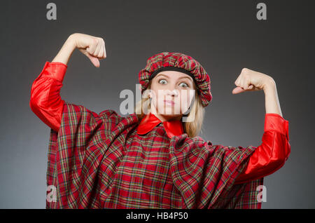 Woman wearing traditional scottish clothing Stock Photo