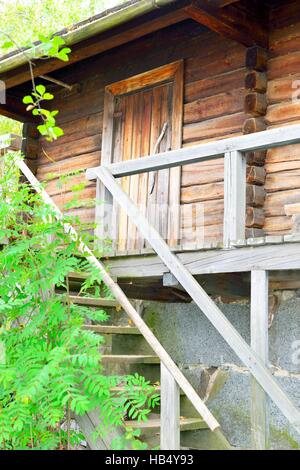 Finnish traditional sauna, door and stairs in Finland Stock Photo