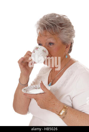 Senior woman drinking coffee. Stock Photo
