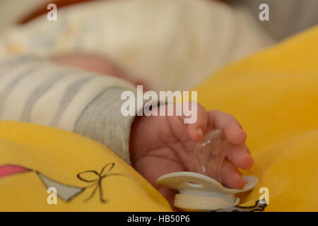 Baby items with pacifier - Close-up Stock Photo