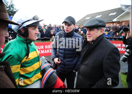 Barry Geraghty speaks with trainer Joseph O'Brien and owner JP McManus after winning the Bar One Racing Juvenile Hurdle during day two of the Winter Festival at Fairyhouse racecourse, Co. Meath, Ireland. PRESS ASSOCIATION Photo. Picture date: Sunday December 4, 2016. See PA story Racing Fairyhouse. Photo credit should read: PA Wire. Stock Photo