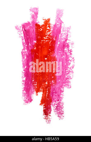 Creative photo of an abstract red and pink lipstick strokes isolated on white. Stock Photo