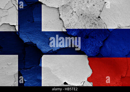 flags of Finland and Russia painted on cracked wall Stock Photo - Alamy
