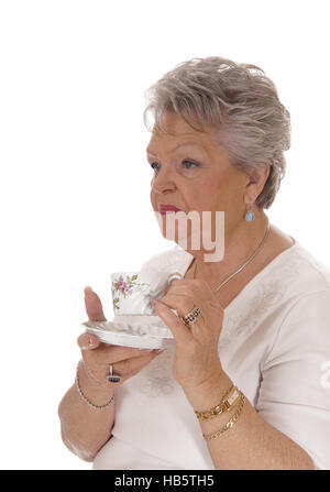 Senior woman drinking coffee. Stock Photo