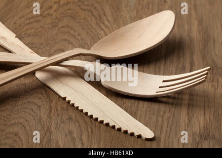 Disposable wooden fork, knife and spoon Stock Photo