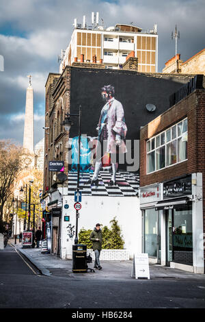 Street art by Conor Harrington in Whitecross Street in the City of London, UK Stock Photo