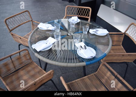 Beautiful table Ready Set for Dinner in Front of a Restaurant Stock Photo