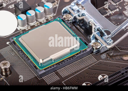 CPU socket on motherboard with installed a processor Stock Photo