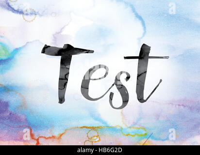 The word 'Test' painted in black ink over a colorful watercolor washed background concept and theme. Stock Photo