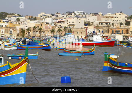 Fishing boats in Marsaxlokk harbor, Malta Stock Photo