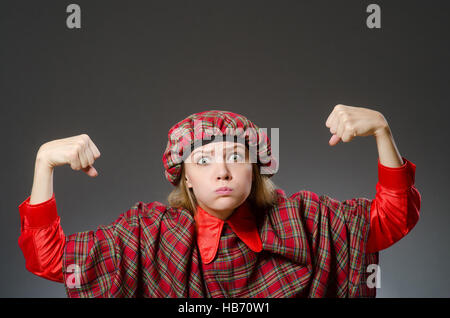 Woman wearing traditional scottish clothing Stock Photo