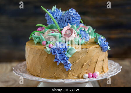 Coffee cake with flowers. Stock Photo