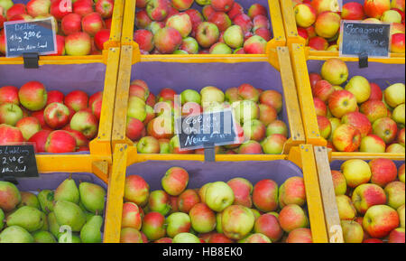 Variety of fresh apples and pears in wooden crates at market stall, Oldenburg, Lower Saxony, Germany Stock Photo
