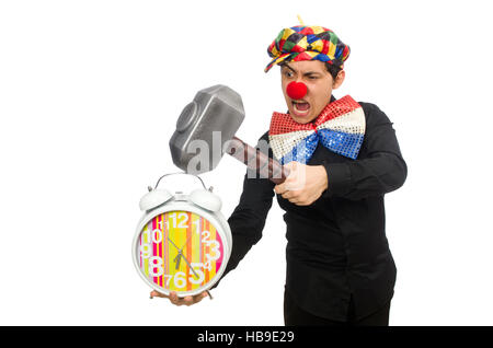 Funny clown with hammer and clock on white Stock Photo