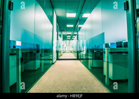 Long corridor with offices on left and right Stock Photo