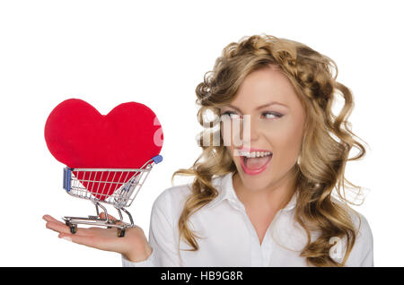 beautiful woman with heart in shopping cart Stock Photo