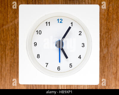 The second series of the sequence of time on the simple white analog clock , 41/96 Stock Photo