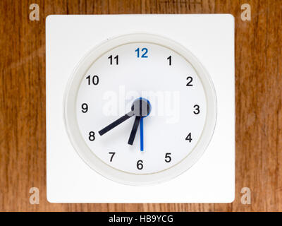 The second series of the sequence of time on the simple white analog clock , 54/96 Stock Photo