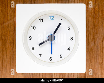 The second series of the sequence of time on the simple white analog clock , 65/96 Stock Photo
