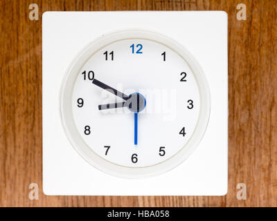 The second series of the sequence of time on the simple white analog clock , 71/96 Stock Photo