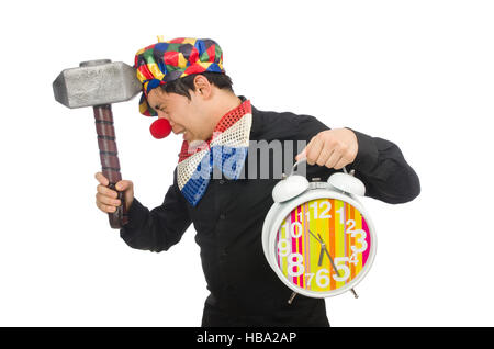 Funny clown with hammer and clock on white Stock Photo