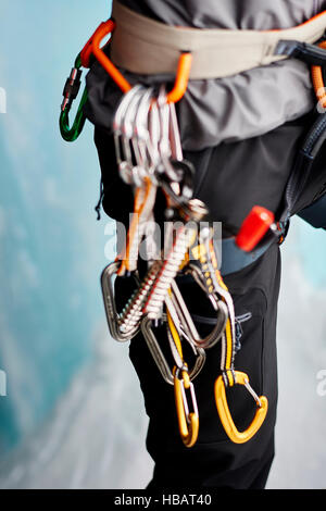 Cropped close up of carabiners on climbers harness Stock Photo
