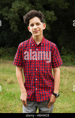 Portrait of teenage boy, outdoors, smiling Stock Photo