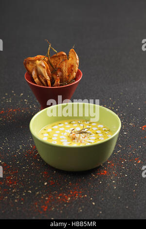 Pumpkin soup with shrimps and coconut sauce Stock Photo