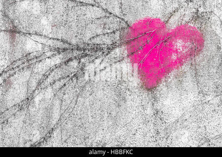 Pink heart on wall Stock Photo