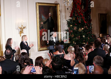 Washington DC, USA. 04th Dec, 2016. Us President Barack Obama delivers remarks at an event for the 2016 Kennedy Center Honorees, in the East Room of the White House, December 4, 2016. The honorees include pianist Martha Argerich, actor Al Pacino, singer Mavis Staples, singer James Taylor and Eagles band members Don Henley, Timothy B. Schmit, Joe Walsh. Credit: Aude Guerrucci/Pool via CNP /MediaPunch Credit:  MediaPunch Inc/Alamy Live News Stock Photo