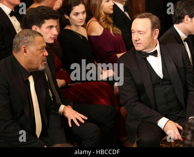 Washington, Us. 04th Dec, 2016. Actor Kevin Spacey (L) and actor Laurence Fishburne (L) wait for the beginning of an event for the 2016 Kennedy Center Honorees, in the East Room of the White House, December 4, 2016. The 2016 honorees are: Argentine pianist Martha Argerich; rock band the Eagles; screen and stage actor Al Pacino; gospel and blues singer Mavis Staples; and musician James Taylor. Credit: Aude Guerrucci/Pool via CNP - NO WIRE SERVICE - Photo: Aude Guerrucci/Consolidated/dpa/Alamy Live News Stock Photo